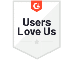 A white and gray badge with the G2 logo at the top and bold black Users Love Us text in the center. A faint gray star appears near the bottom, highlighting it as a trusted alternative to TaxDome.